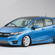 Illustration for article titled A Honda Fit With A Grom In The Back Is Something We Need Yesterday